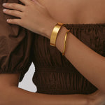 Edge Cuff and Mene Bangle.