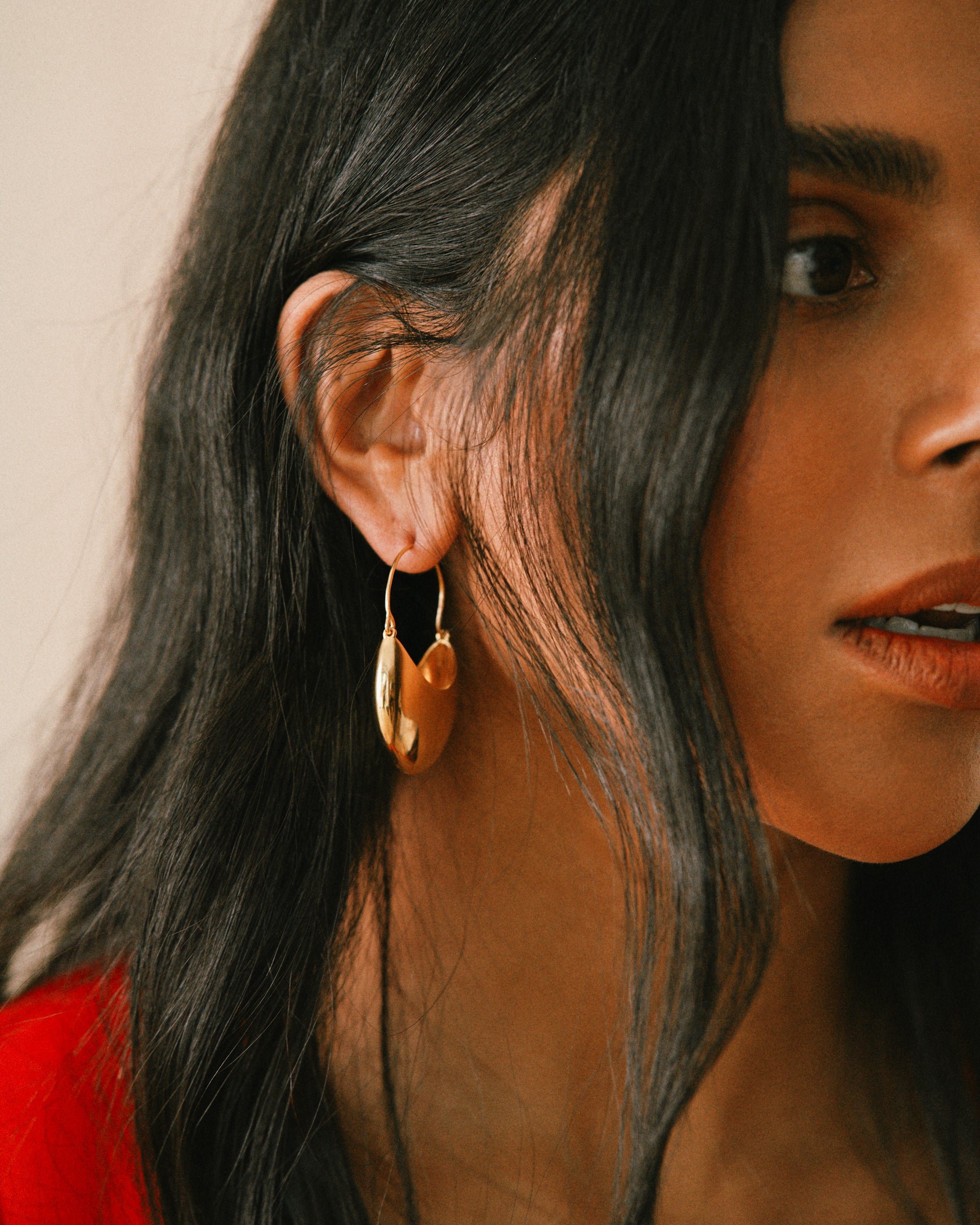 Monikh Dale x Daphine Vol. II. Monikh wears the Rochelle Gold Plated Hoop Earrings.