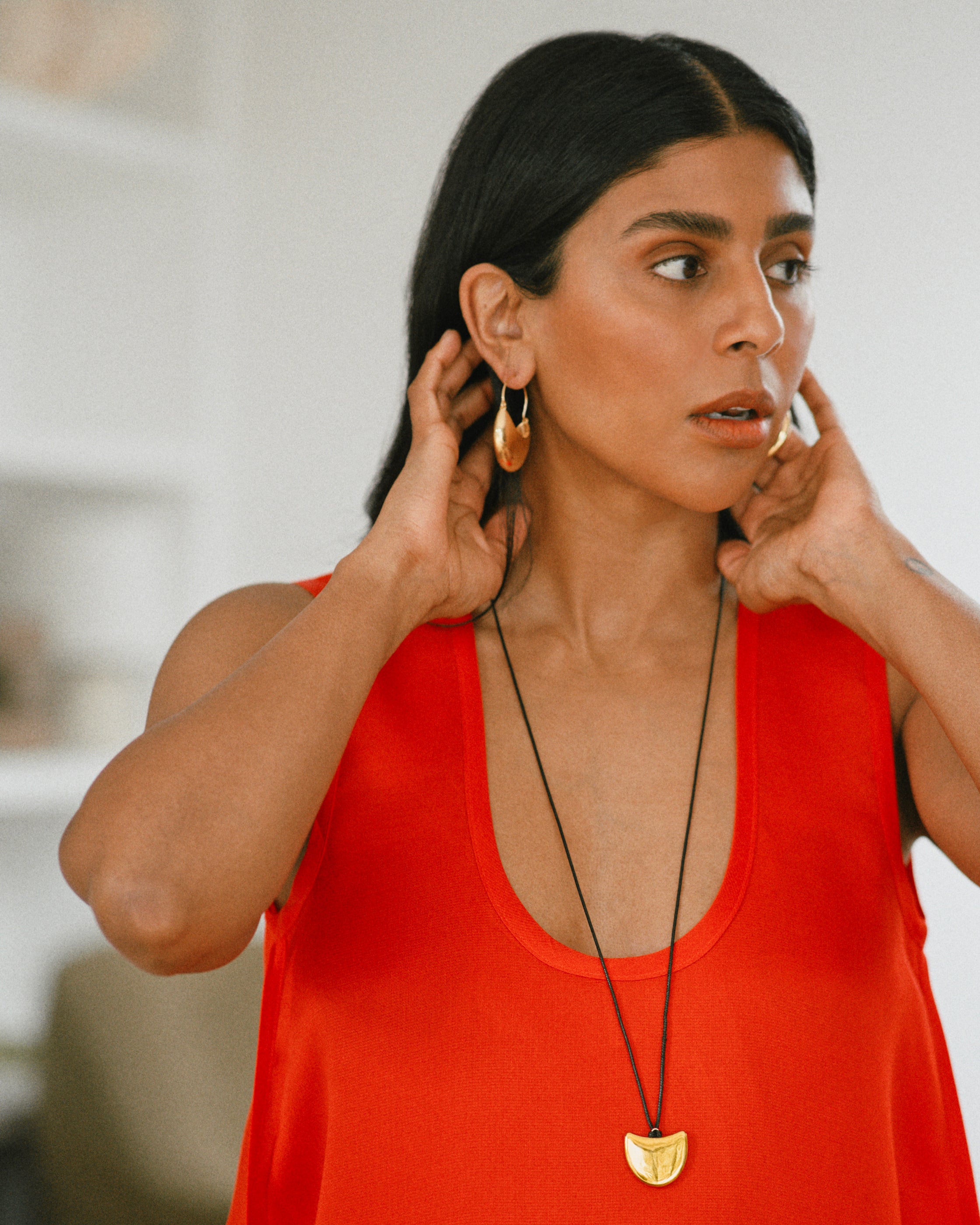 Monikh Dale x Daphine Vol. II. Monikh wears the Rochelle hoop Earrings and Singh Necklace.