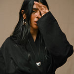 Monikh Dale x Daphine Vol. II. Monikh wears the Rochelle Sterling Silver Plated Hoop Earrings and Singh Sterling Silver Plated Pendant Necklace.