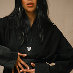 Monikh Dale x Daphine Vol. II. Monikh wears the Rochelle silver Earrings and the Singh Silver Pendant Necklace.
