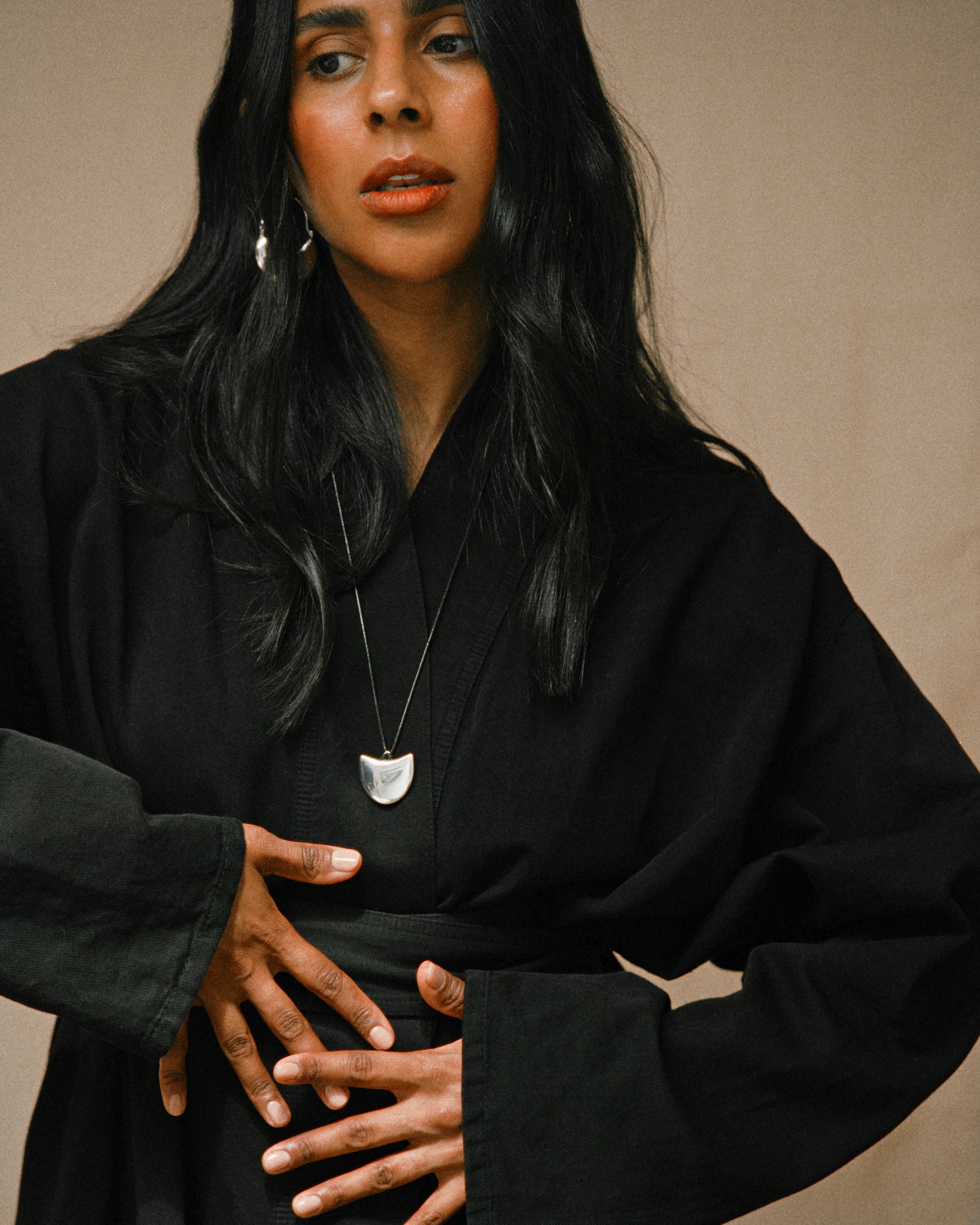 Monikh Dale x Daphine Vol. II. Monikh wears the Rochelle silver Earrings and the Singh Silver Pendant Necklace.